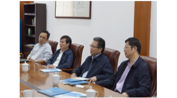 广西政协副主席、百色市委书记彭晓春会见幸运传世董事长王双飞